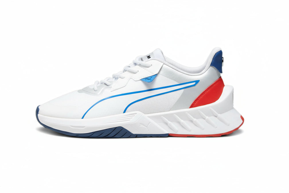 White sneaker with blue and red accents on a white background